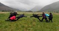 Group of Venture Scotland students doing team building exercise outdoors at Glen Etive